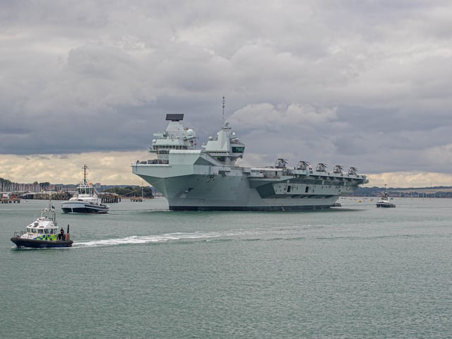 HMS Queen Elizabeth leaves Portsmouth on 9 September 2020. Pictured: View from Still & West Pub, Portsmouth of HMS QE. Picture: Habibur Rahman