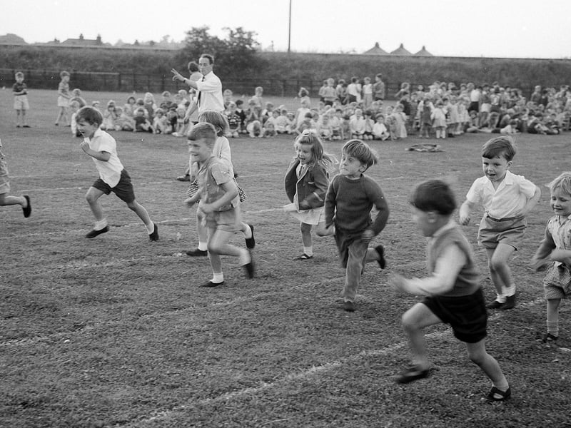 Youngsters enjoy a sprint race. One runner seems have lost his lane. This was taken in 1965 during a sports day at Newgate Lane.