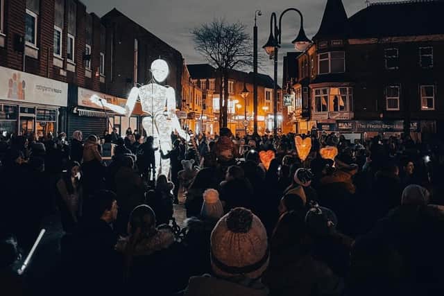 A giant illuminated puppet helped attract the crowds in Sutton.