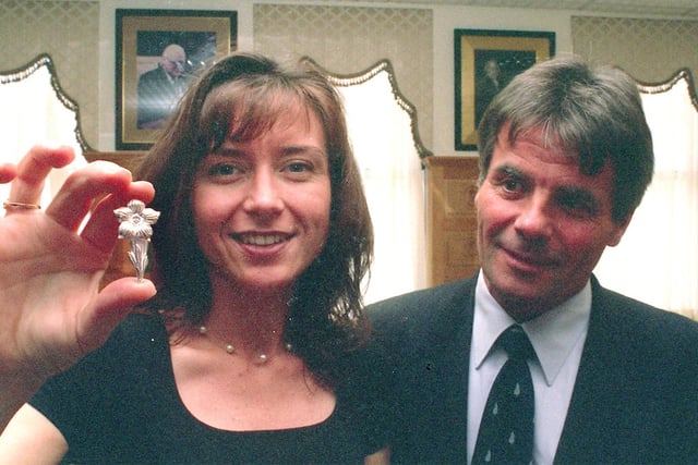 A Silver brooch in the shape of a flower has been designed and made by the Assay Office to be sold for funds for Breast Cancer research, Charlotte Speak left who made the brooch and designer Wally Hayes with the brooch in 1999
