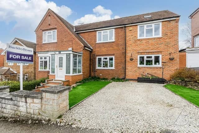 The property boasts a private frontage with well-maintained lawn areas, and steps leading up to the front door, along with the added benefit of a garage. Not to mention there a re two private driveways, one gravel and the other being brick leading to the garage.