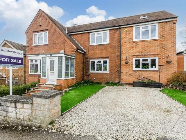 The property boasts a private frontage with well-maintained lawn areas, and steps leading up to the front door, along with the added benefit of a garage. Not to mention there a re two private driveways, one gravel and the other being brick leading to the garage.