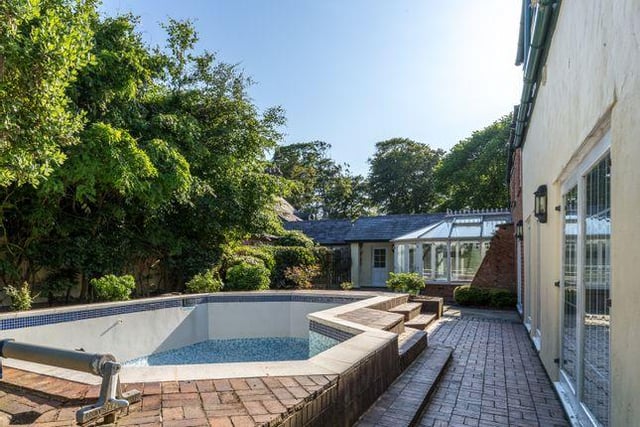 The outdoor swimming pool at Woodlands Cottage.