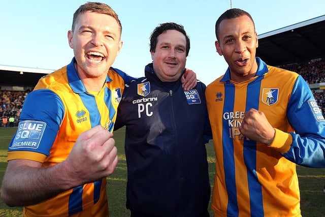 John Dempster, Paul Cox and Matt Green celebrates after winning the Blue Square Bet Premier and securing promotion back to the Football League.