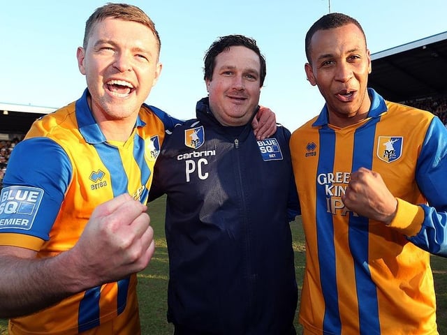 John Dempster, Paul Cox and Matt Green celebrates after winning the Blue Square Bet Premier and securing promotion back to the Football League.