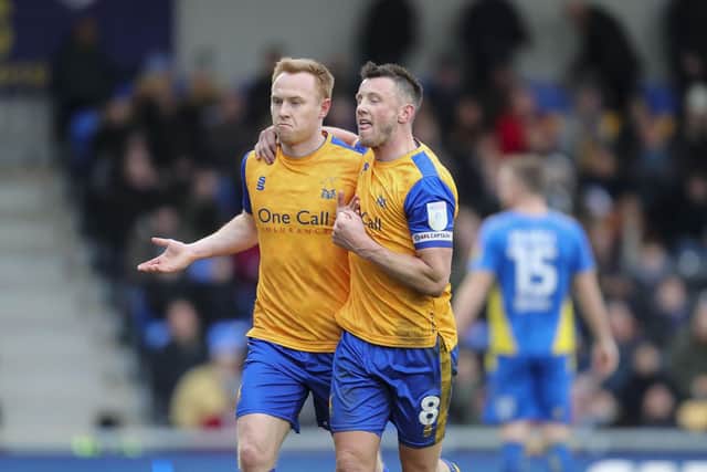 Danny Johnson celebrates his goal with Ollie Clarke. Photo by  Chris Holloway / The Bigger Picture.media