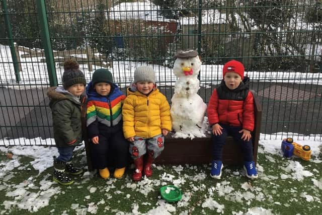 Wynndale Cherubs nursery children pictured with their new friend the snowman.