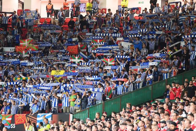 Fans of Real Sociedad respect a minute's silence for the Queen's at Old Trafford on Thursday.