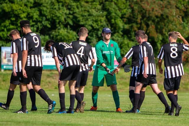 Lewis Warwick in his unfamiliar role as goalkeeper. Pic by Dan Walker.