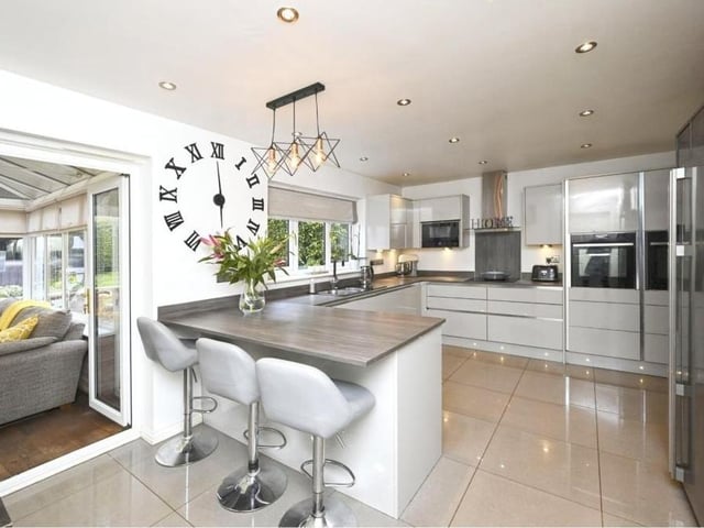 The contemporary look to the property's kitchen diner is down to the fact that it was fully renovated only five years ago. As the big clock indicates, it was ahead of its time.