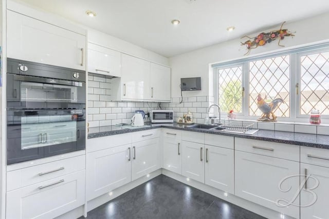 Even a master chef would love cooking family meals in this kitchen! It boasts an integrated double oven and hob with extractor fan above, and there is an abundance of space to utilise. Downlights and a large window to the back of the bungalow add to its appeal.