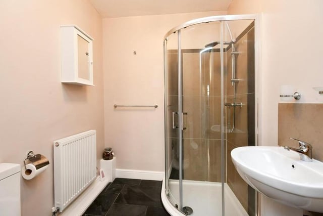One of the double bedrooms sits on the ground floor of the property - and not far away is this handy shower room.