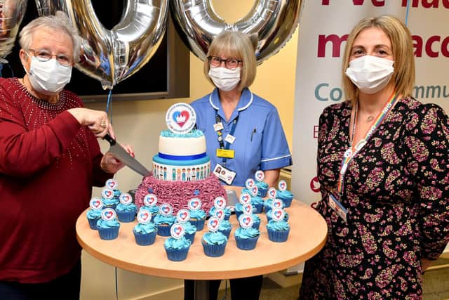 Kim Kirk, right, marking the first anniversary of the first Covid jab at King's Mill Hospital.