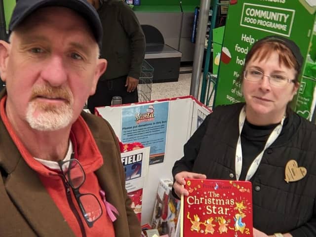 Donna Pullen at Morrisons, Kings Mill collecting books.