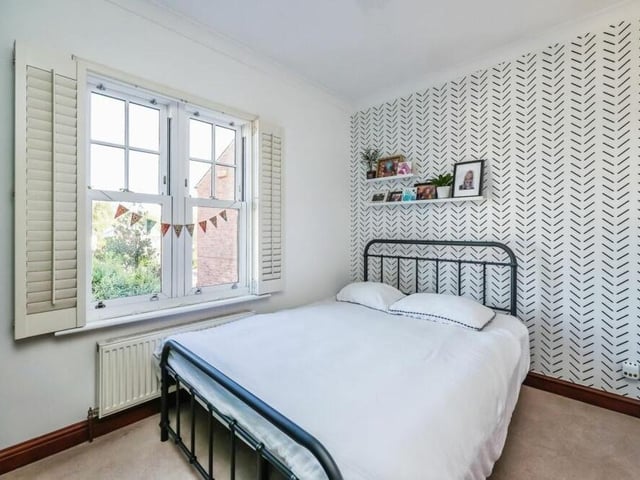 Bedroom number three, which overlooks the front of the property, is another relaxing retreat.