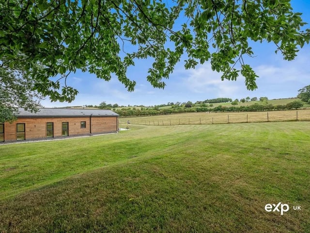 There are gardens on three sides with expansive lush lawned areas, a terrace with plenty of room for garden furniture, al fresco dining and relaxing, and a further additional patio being westerly facing to catch the last of the evening sun.