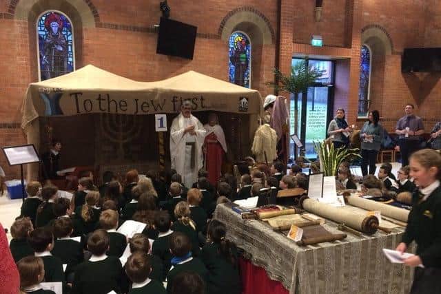 School children attend one of the Bible Comes to Life Exhibits