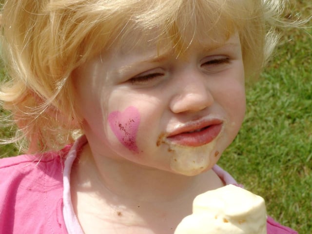 Kira-Nerys Lancashire from MWH enjoyed an ice cream at the Summer Play Day at Carr Bank Park in 2006.