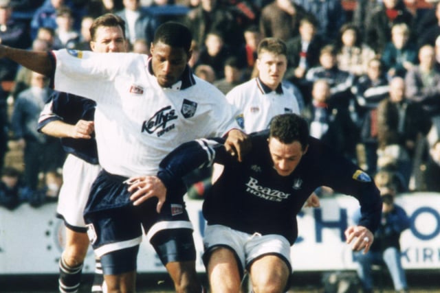 Tony Rougier tackles Falkirk's Andy Millen as Raith come out on top in a five-goal thriller from April 1996.