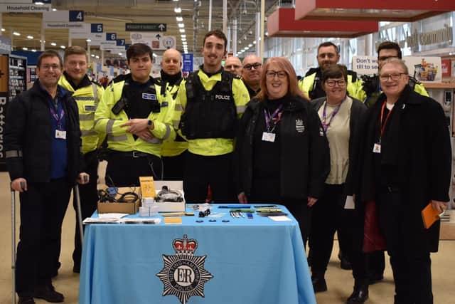 Andy Abrahams, Mansfield mayor, left, joins police and council officers at the day of action in the Tesco Extra store on Jubilee Way South, Oak Tree.