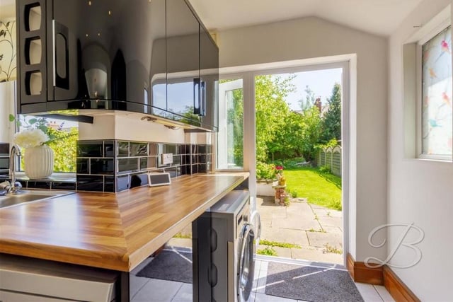 A pair of French doors give handy access from the kitchen to the back garden of the Layton Avenue property.