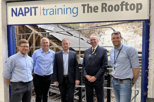 College principal Andrew Cropley, head of centre for building services Andrew Stevens and apprenticeships manager Paul Stringer visit ‘The Rooftop’ solar panel training facility at NAPIT’s Low Carbon Technologies Centre of Excellence, pictured with the company’s commercial and compliance director Stephen Melton and head of training Brett Forster.