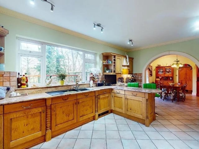 A well laid out kitchen fitted with high quality handcrafted solid oak units & premium grade granite working surfaces and a breakfast/dining area and pantry.