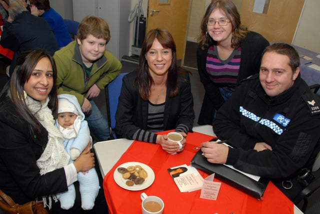 Former Ashfield MP Gloria De Piero, at a surgery in Kirkby's Ashwood Centre. Gloria was joined at the event by Sgt. Carl Holland, right, from Neighbourhood Policing, they are pictured talking to local residents, from the left; Naznin Attan, William Brown and mum Amanda Brown.