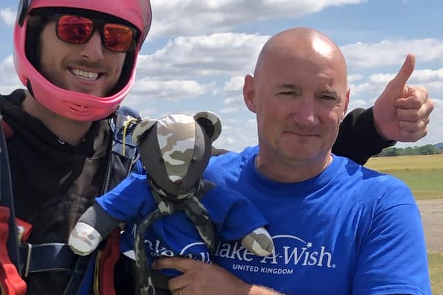 Carl with skydive instructor Ryan and Corah the teddy bear.