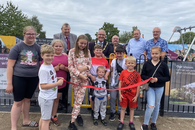 Children cut the ribbon to open the new play area on the Bellamy estate in Mansfield