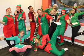 Staff at West Nottinghamshire College in Mansfield dress up as elves as part of a fun Christmas campaign by students to raise money for the Alzheimer's Society.