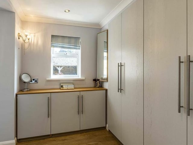 This is the private dressing room that is attached to the master bedroom. Wardrobes and storage space come in very handy.