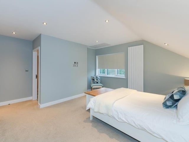 One of the five bedrooms at the Lambley Lane property. A simple but polished style, don't you think?