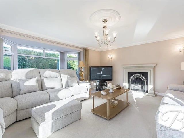 A light and airy main reception room with the feature focal point being the stunning gas fireplace. Patio doors leading to front elevation, bay window and window to side elevation providing an excellent source of natural light.