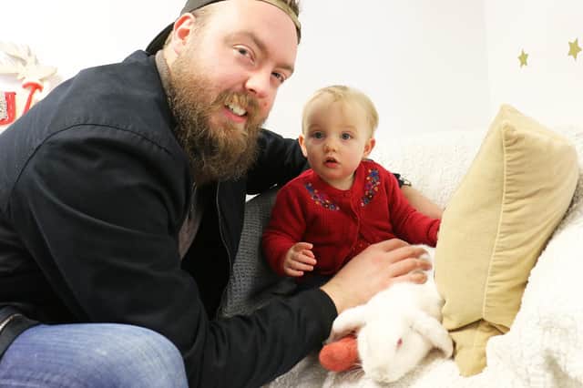 Joe Copestake introduced daughter Emilia, aged one, to the rabbits.