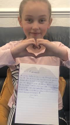Macie Scarborough wrote a letter thanking her teacher.