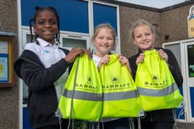 Dalestorth Primary School pupils with the hi-vis kit bags
