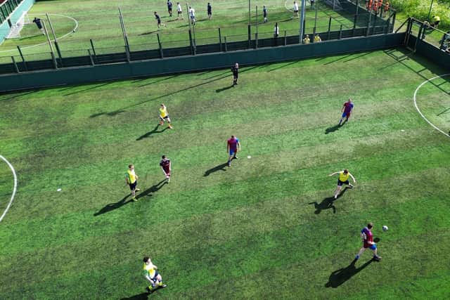 One of the games underway at Barratt and DWH's charity football tournament