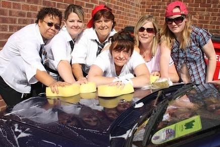 2009: Staff at Iceland in Eastwood are pictured washing a car at their charity car wash.