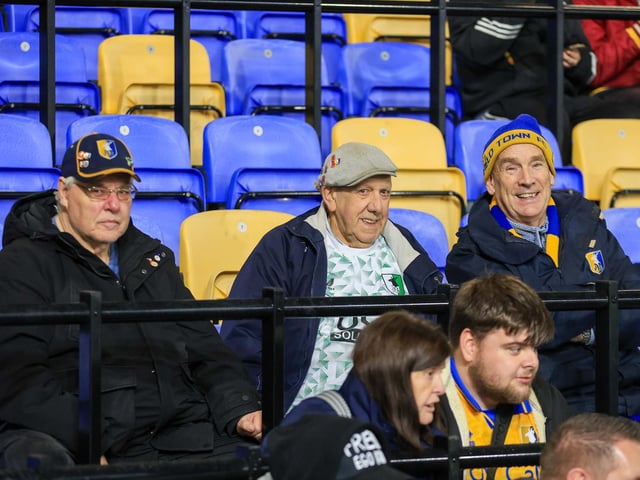 Travelling Mansfield Town fans during the Sky Bet League One match against AFC Wimbledon at Stadium Plough Lane.