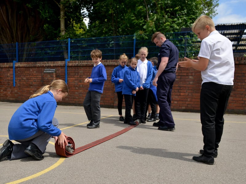 Careers day at Mapplewells Primary School. where children were learning about the work of a Firefighter