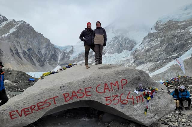 Kimberley resident Gavin Skevington (left) and his son Alexander Skevington standing triumphant at Everest Base Camp.