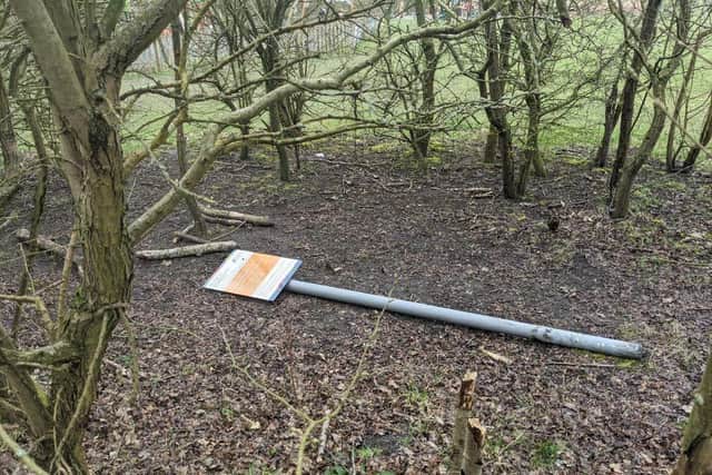 The sign at Vicar Water Country Park which has been pulled down by thugs.