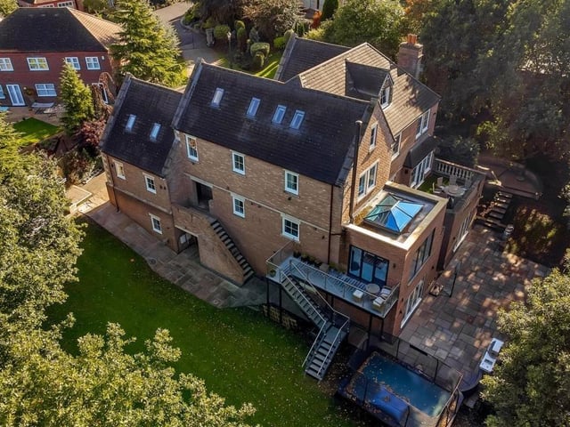 This aerial shot from a drone gives you a good idea of the sheer expanse of the house and the plot it sits in. Note the two balconies.