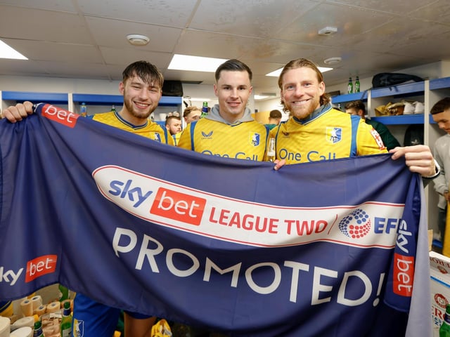 Mansfield Town's fans and players celebrated promotion to League One long into the night.