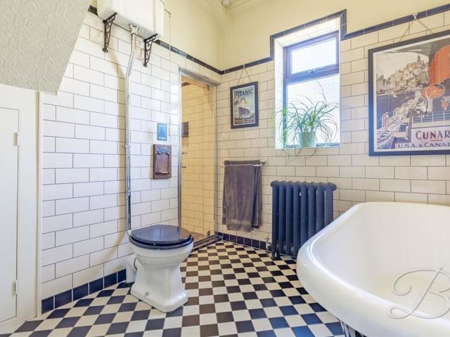 The bathroom from a different angle. You can see the characterful shower cubicle in the background (centre).