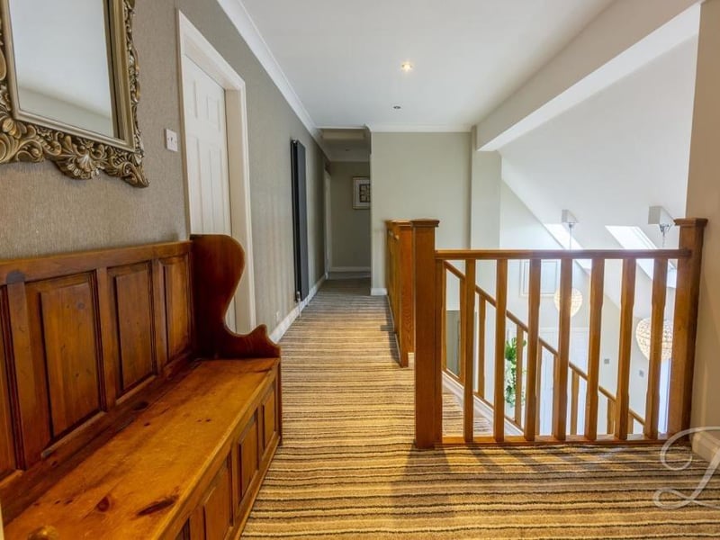 The first-floor landing has a touch of charm about it, don't you think?