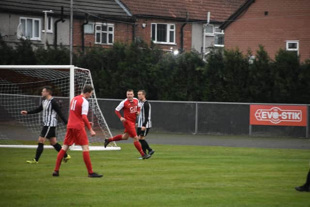 Ross Duggan opens the scoring in a 1-1 draw with Penistone