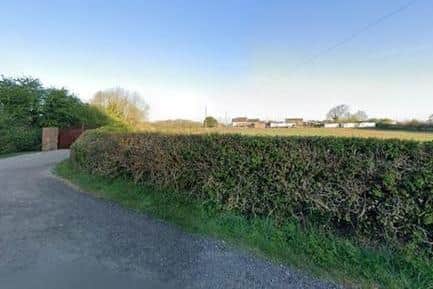 A view looking towards the land from Brand Lane.