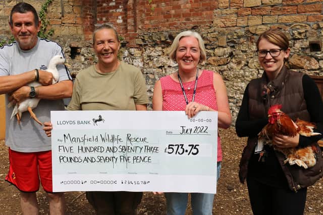 Cheryl Martins (second left), founder of Mansfield Wildlife Rescue, and Ray Macpherson (first left), chair of trustees, receive the donation from the college, presented by learning resources adviser Claire Barke (second right) and animal care teacher Stacey Allcock.